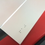 solid aluminum with a V grove cut in the sign with stainless Steel Grade 2 Braille