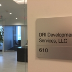 solid aluminum with a V grove cut in the sign with stainless Steel Grade 2 Braille