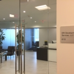 solid aluminum with a V grove cut in the sign with stainless Steel Grade 2 Braille